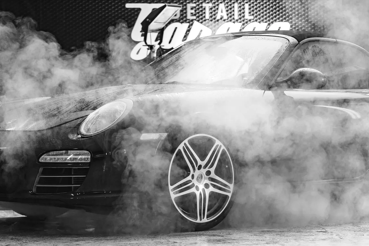 Steam rising around a wheel during detailing
